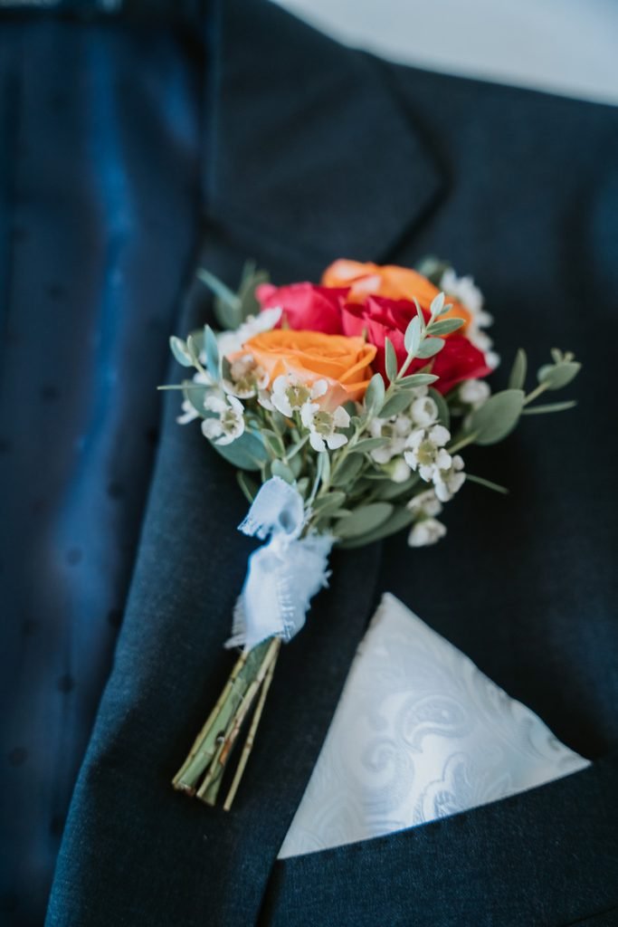 getting ready groom boutonniere