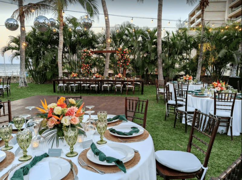 green and orange set up Wedding services in Los Cabos