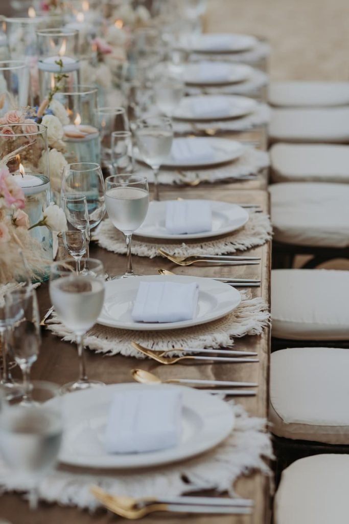 gold silverware and chargers set up rentals